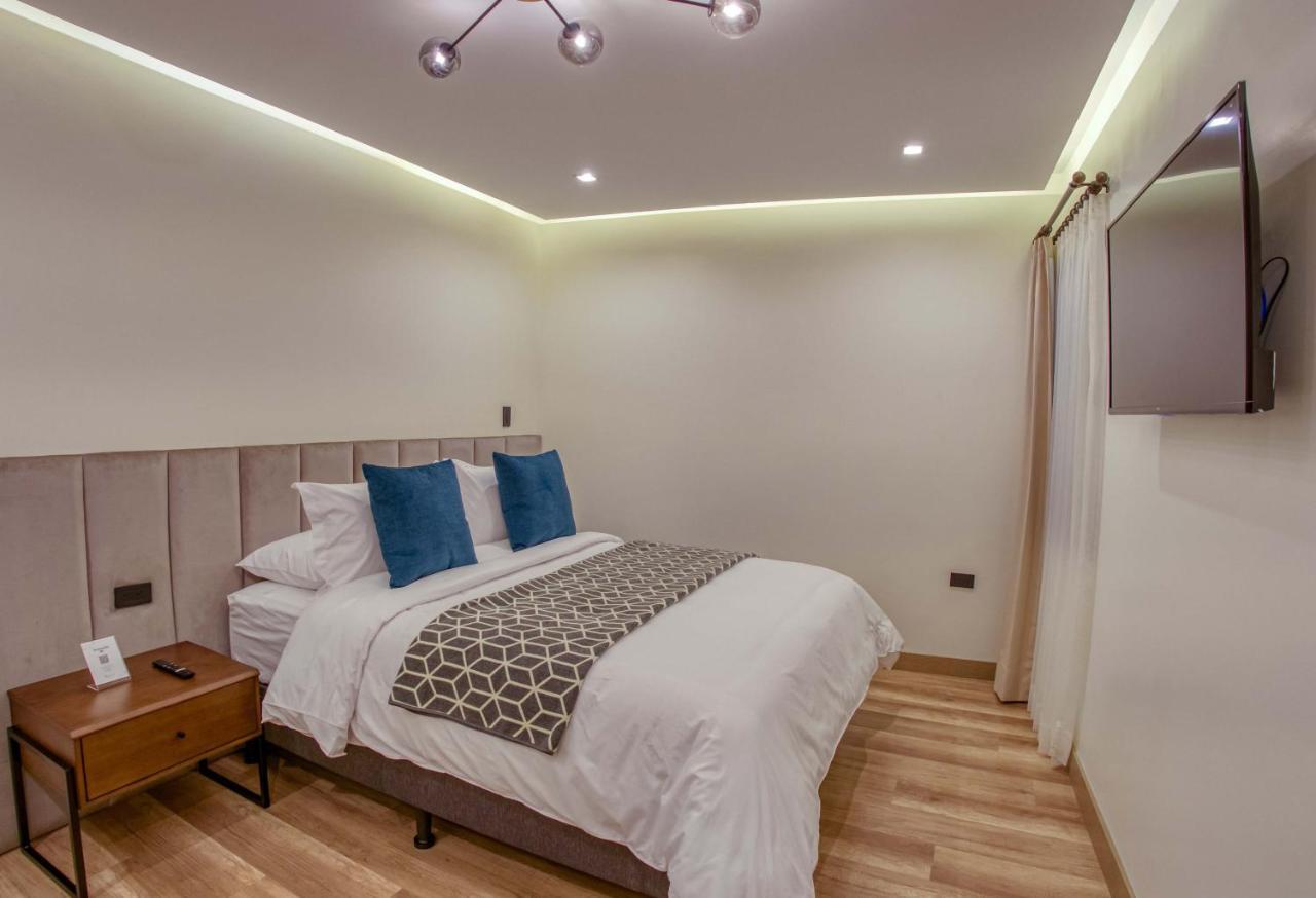 Wanderlot - Hotel Plaza Central Riobamba Esterno foto